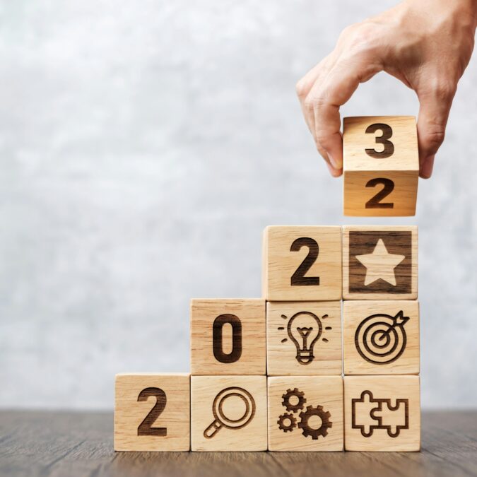 2023 wood block with business success, goal, strategy, target and New Year start concept